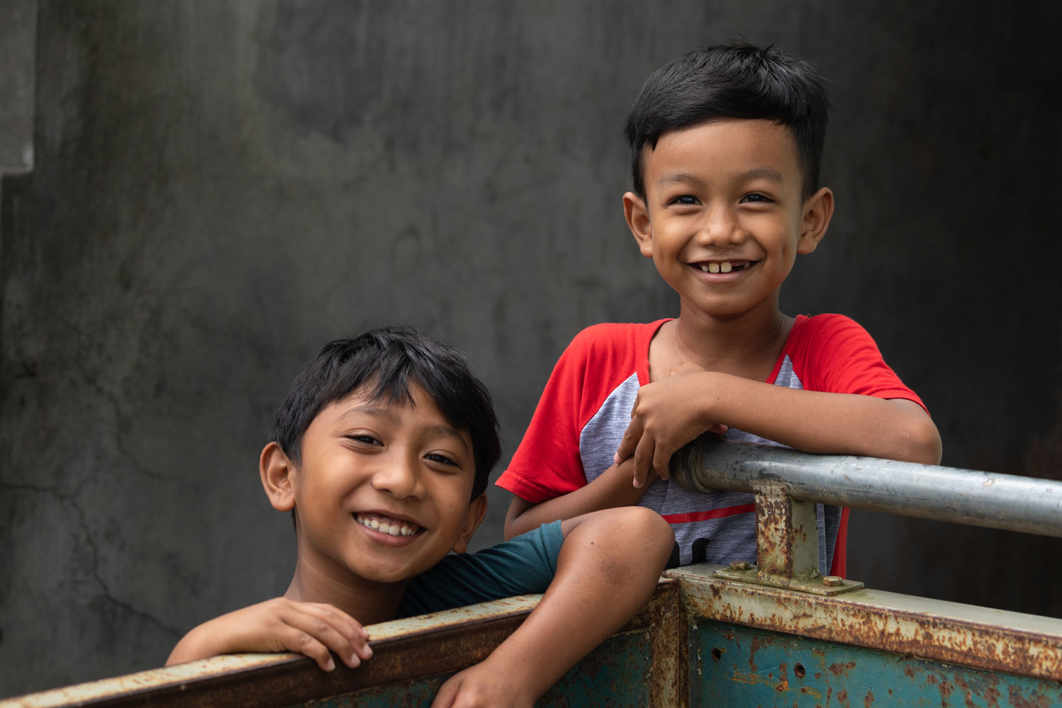 Two young smiling boys